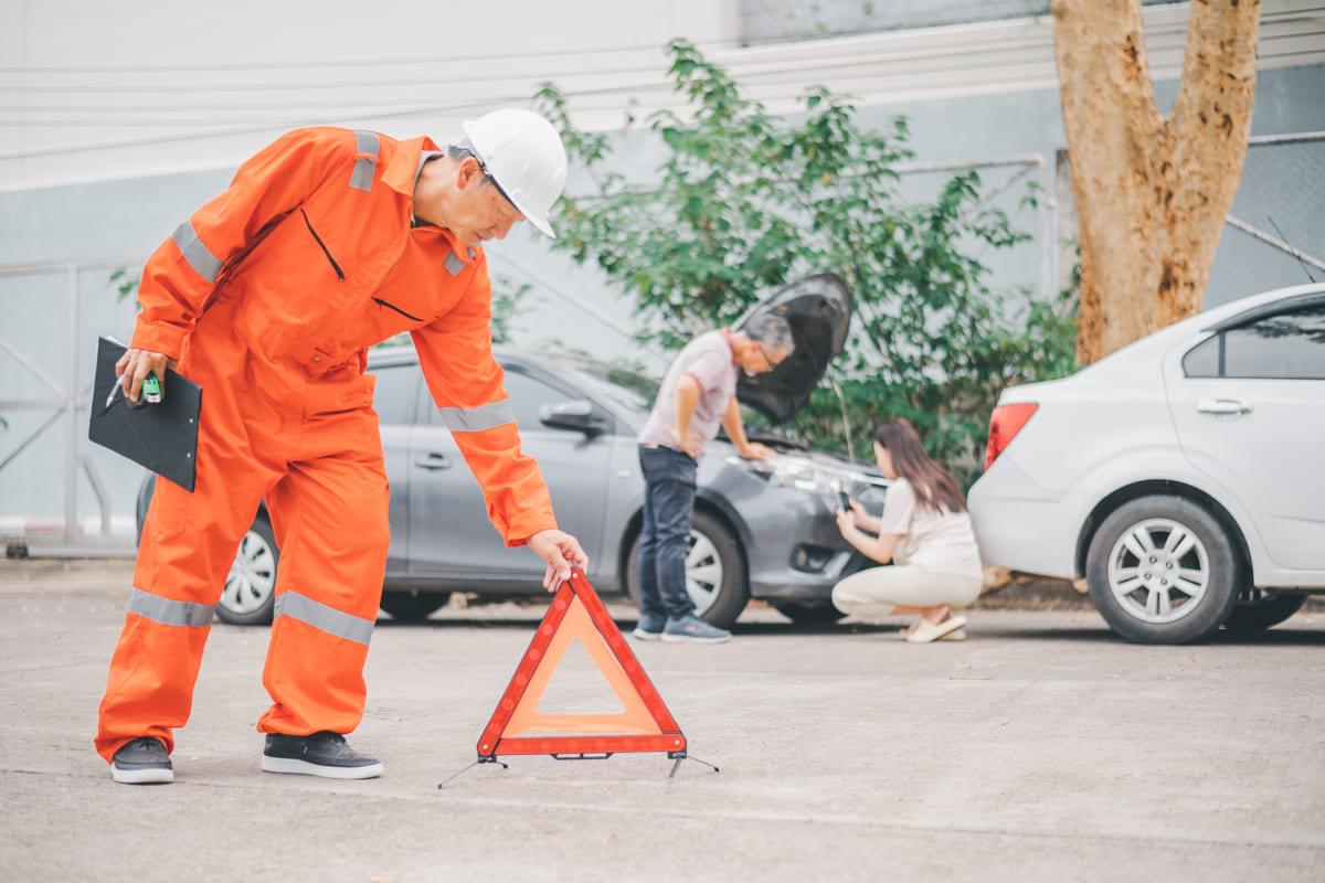 Insurance officers at accident scene