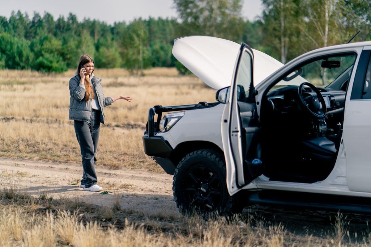 Broken car on roadside